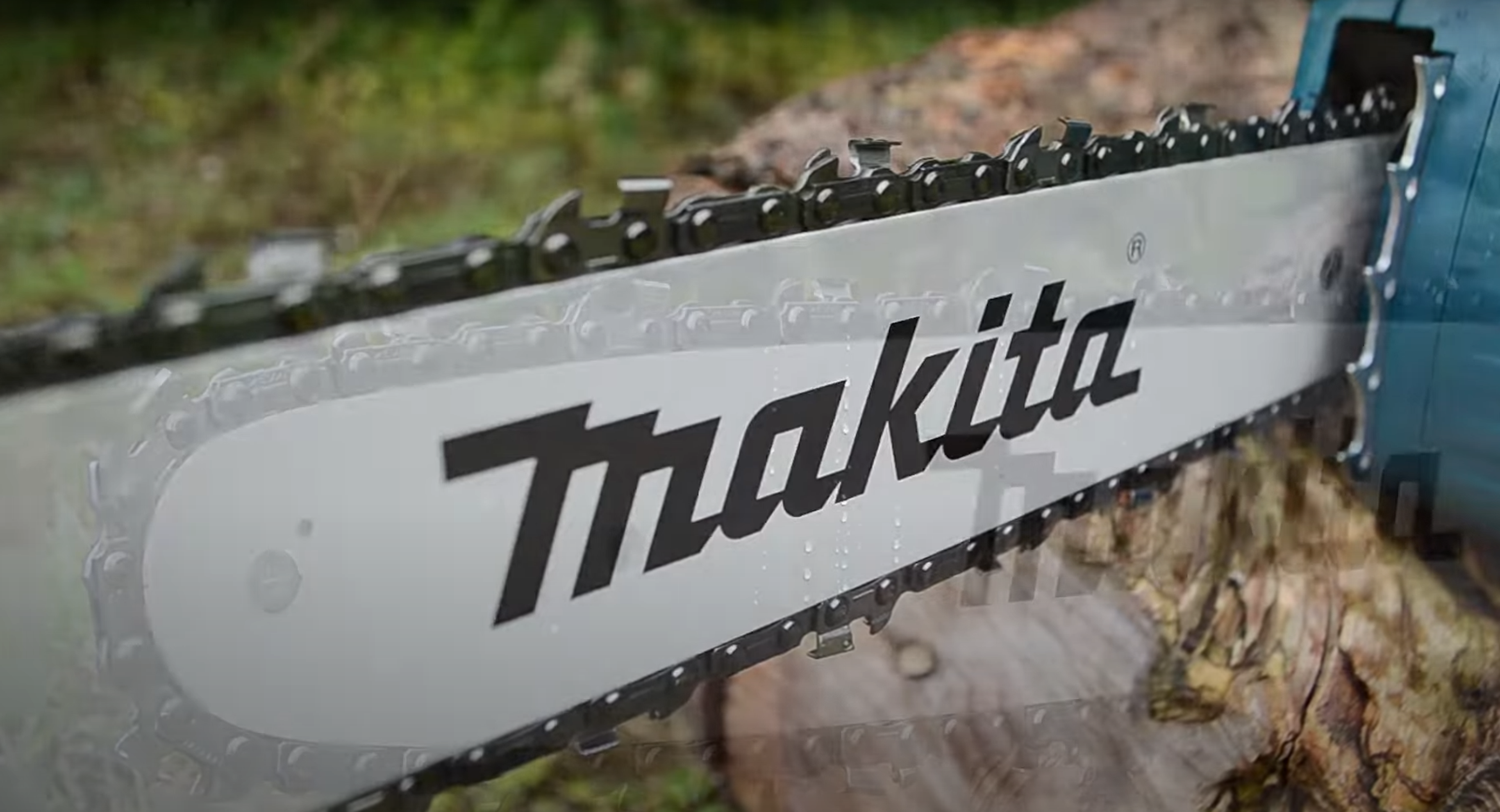 Load video: Makita UK DUC355 350mm Chainsaw